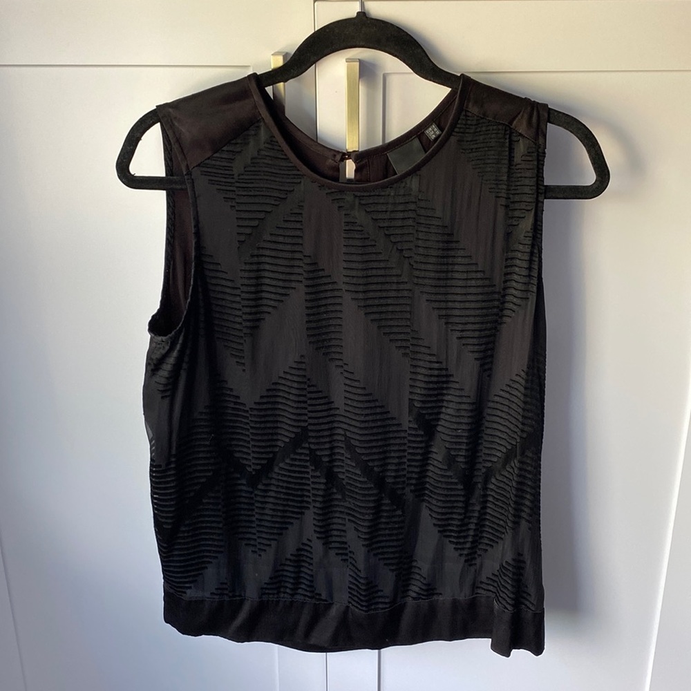 Black sleeveless blouse
